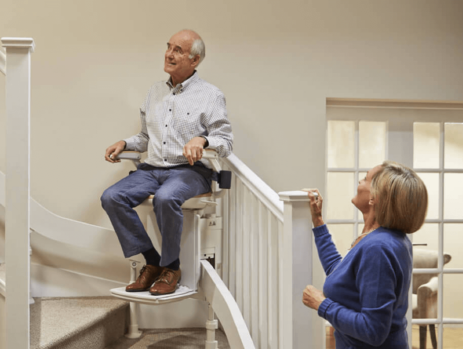 Acorn Stair lifts in use going up the stairs