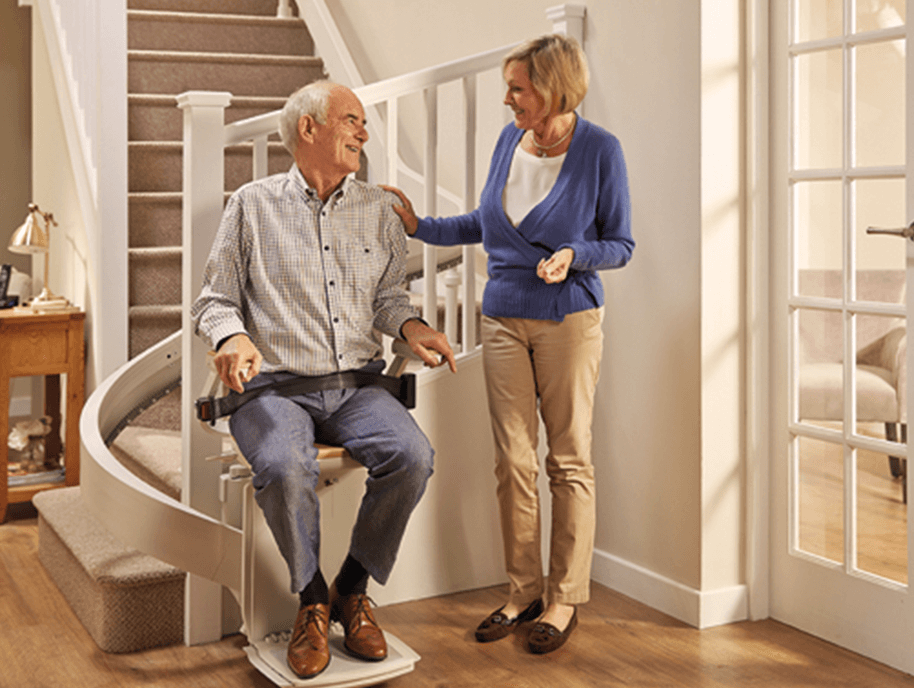 Senior couple with their stair lift 